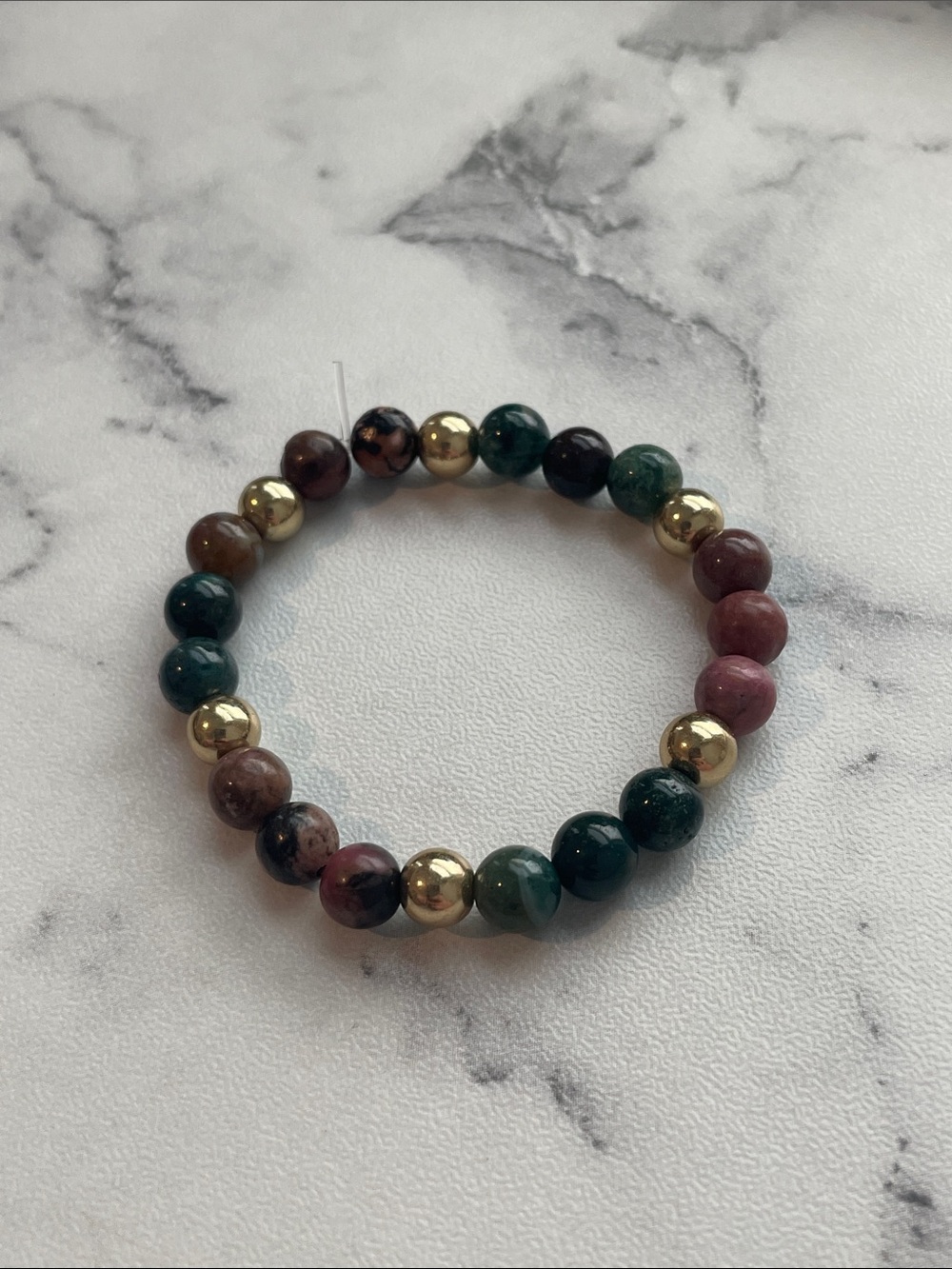 Natural stone, hand beaded elastic bracelet. 5 inches.